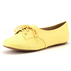 Yellow canvas jazz pumps