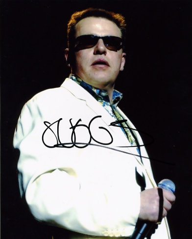 - SUGGS SIGNED 10 x 8 INCH COLOUR