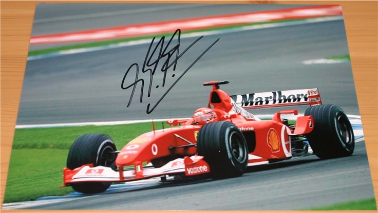 MICHAEL SCHUMACHER HAND SIGNED 10 x 7 INCH