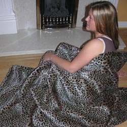 leopard patterned faux fur throw