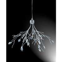 Delicate halogen fitting with polished chrome branches with complementing clear glass crystal leaves