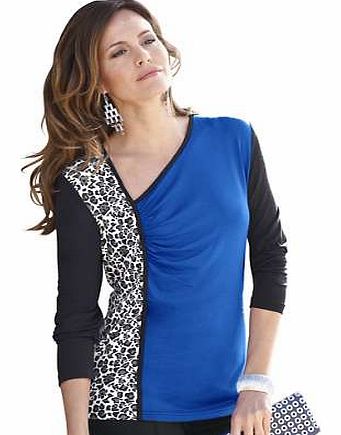 The front of this sophisticated top combines leopard print and plain sections, while the long sleeves and the back are in black. The asymmetric v-neck and the gathers are chic highlights. Alessa W. Top Features: Flattering fit Washable 95% Viscose, 5