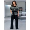 Wool blend. With self tie belt and side pockets. Pleat detail on sleeve cuff. Washable. 50 Wool, 50 