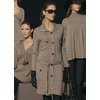 Elegant cardigan with front, pockets and cuffs finished with faux horn buttons. Low belt loops. Knit