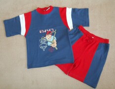 Blue short sleeved t-shirt with red and white tirm at armholes and red neck
