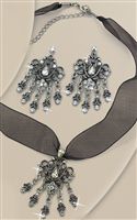 Pretty 4.5cm (1¾&quote;) pendant on a black ribbon. Length 40cm (15¾&quote;) with 6cm