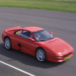 Drive an F355 around a super fast circuit