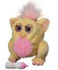 Hey, this is a Furby Baby! Its very little but it likes to have lots of fun! \"Feed\" it its bottle