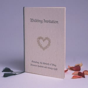 These green tassels wrap around the spine of an A5 (21cm) invitation, leaving the green tassels
