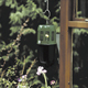 Small hanging paraffin heater for a cold-frame or small area of a greenhouse.