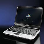 Option 1  Mobile Intel Celeron M370 1.5Ghz Processor.  Microsoft Windows XP Home Edition. 15.4ins