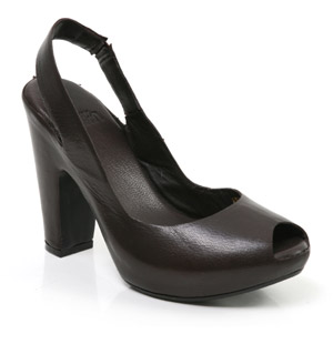 Leather sandal with covered platform and sling back detail. The Lecover shoe with peep-toe detail wi