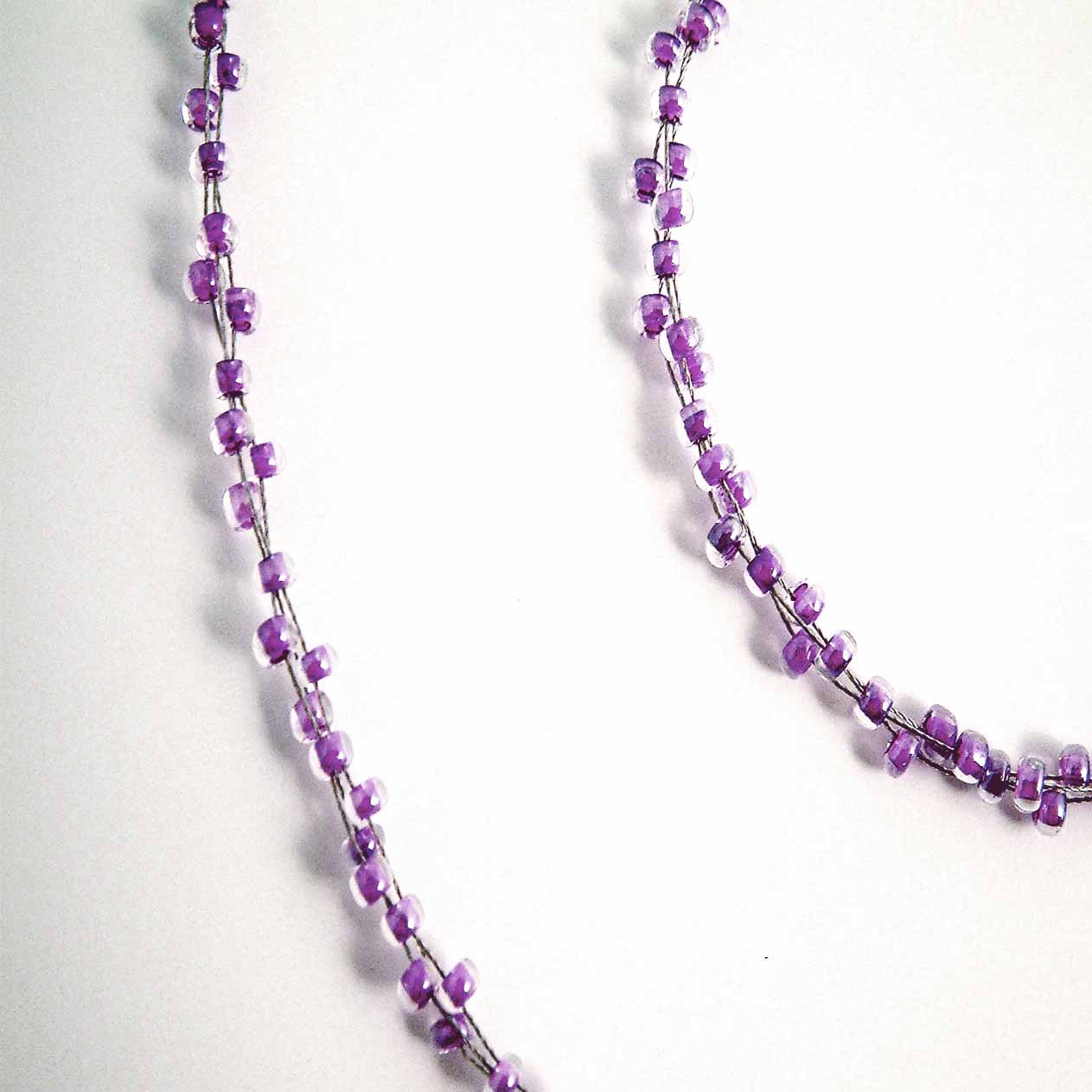 This matching necklace  bracelet and earrings is a very attractive set of jewellery.  All handmade