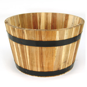 Made from acacia  this traditional wooden barrel-style planter has a superb natural finish. Coated w