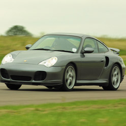 Drive a nine eleven round the Thruxton circuit