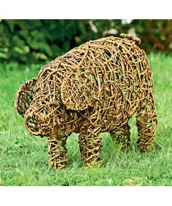 Woven rattan pig. Colour natural. Size approx. (H)35, (W)21.5, (D)49cm.