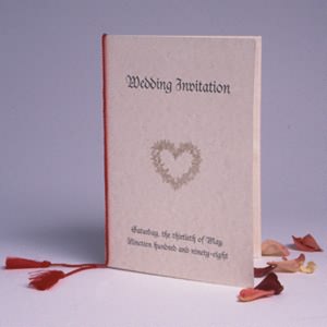 These red tassels wrap around the spine of an A5 (21cm) invitation, leaving the red tassels