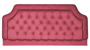 A luxurious fabric headboard from the Stuart Jones