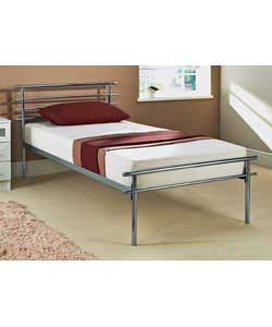 Single contemporary bedstead in chrome coloured frame. Supplied with metal slats. Includes cushion