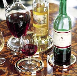 Three smart clear glass coasters, two small and on