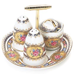 Both table centre piece and cruet. This four piece